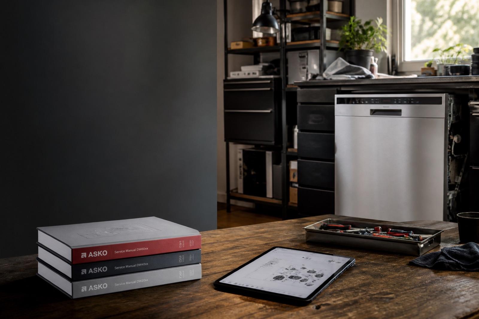 ASKO technician explaining a repair in a premium kitchen