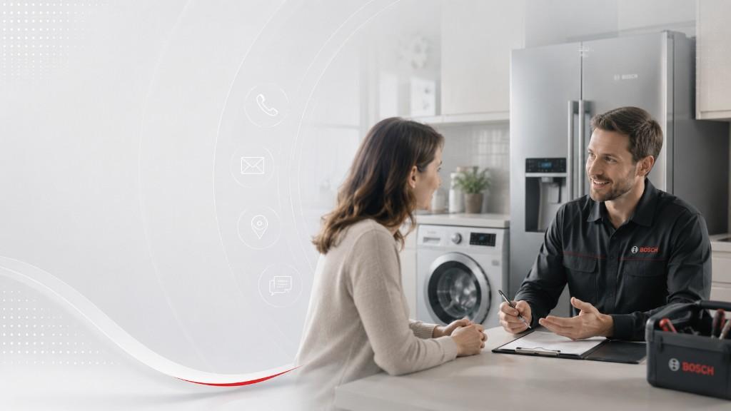 Contact desk beside a premium kitchen with an ASKO dishwasher