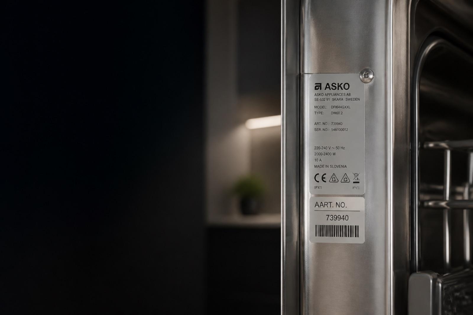 ASKO laundry appliances in a premium home — model reference library